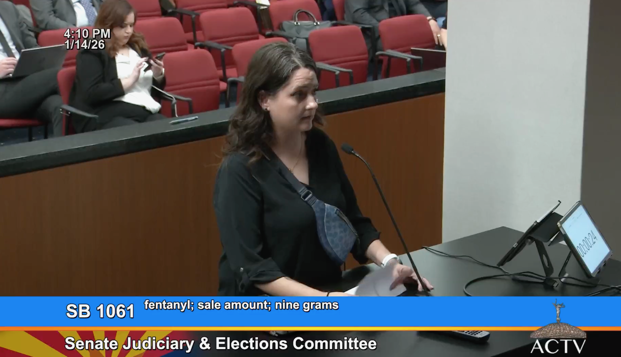Kara Janssen testifying before the Arizona Senate Judiciary Committee